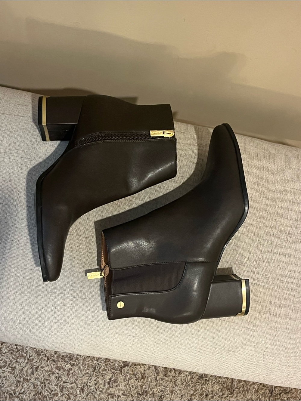 Calvin Klein Dark Chocolate Leather Ankle Booties with Gold Trim, size 6